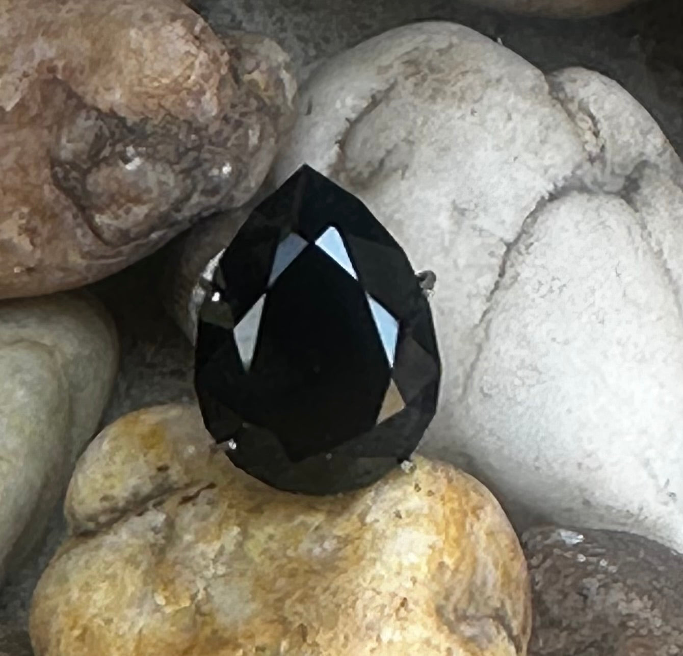 9.79ct blackish blue Sapphire